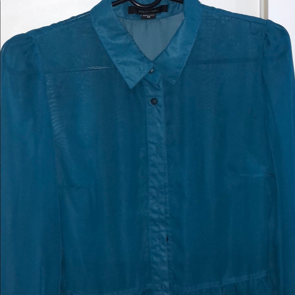 A turquoise blouse